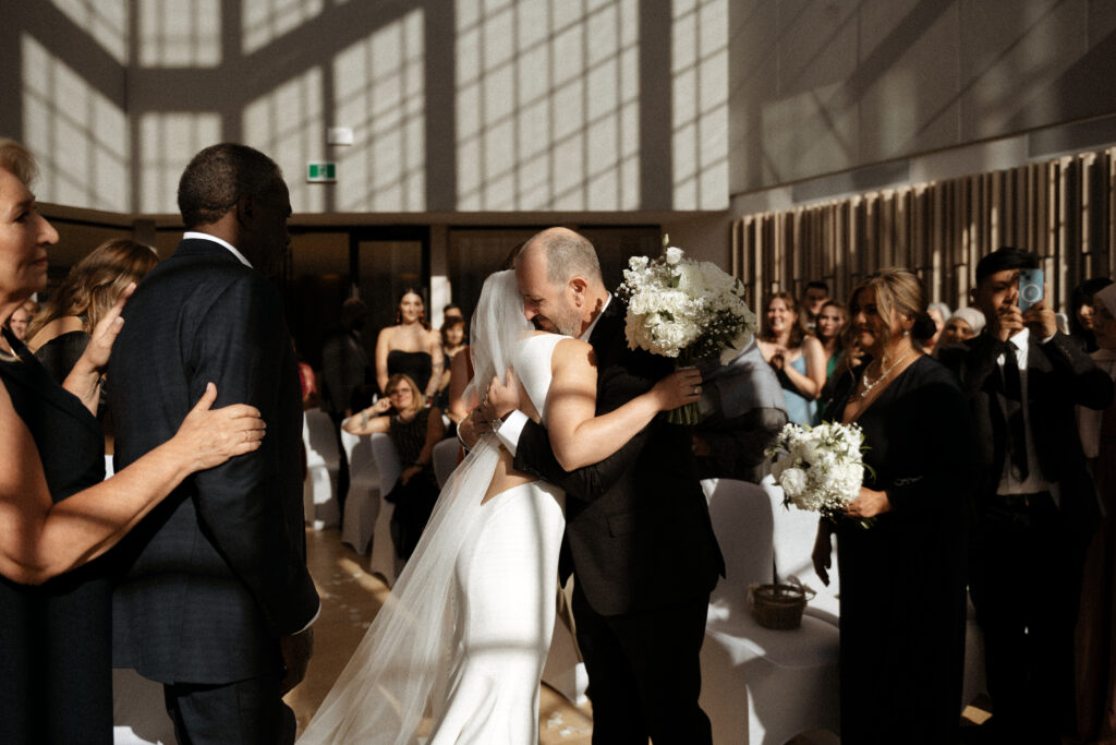 Graceful Entrance: Zeba's Radiant Journey Down the Aisle with Her Father - Toronto Luxury Wedding"