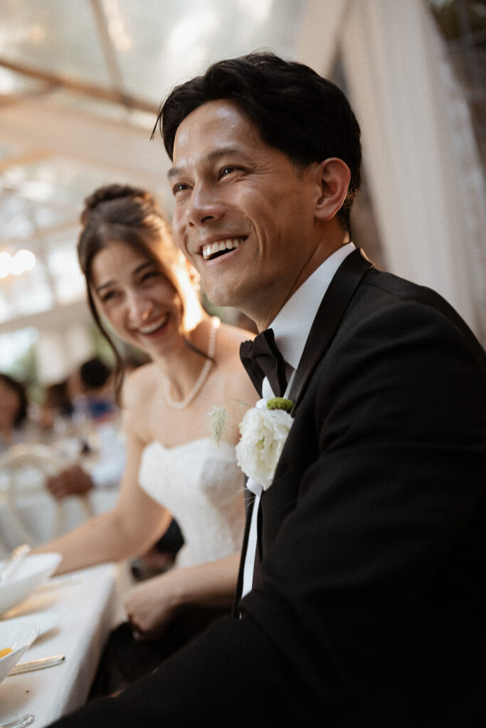 Graydon Hall Manor wedding reception in Toronto gardens with emotional wedding speeches