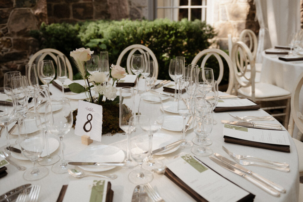 Graydon Hall Manor wedding reception in Toronto gardens with stunning floral arrangements