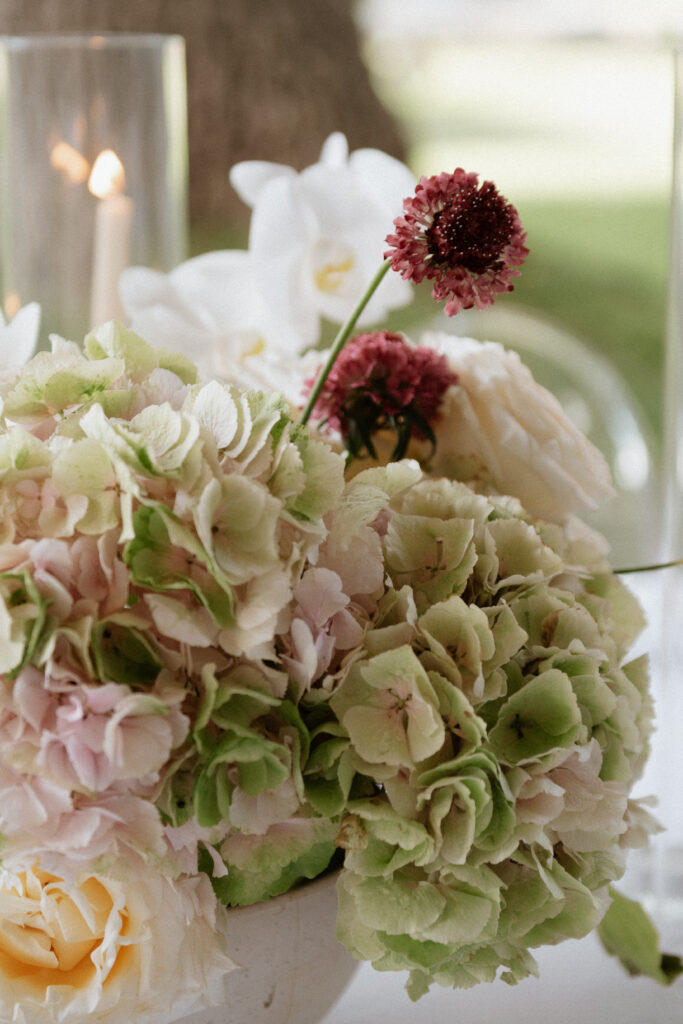 Editorial wedding reception design with candlelight and florals